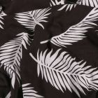 Tissu Viscose toucher crêpe Feuilles de palmier blanches sur fond Noir - Par 10 cm