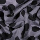 Tissu Suédine Jersey Pois noirs sur fond Gris - Par 10 cm