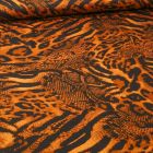 Tissu Tissu Coton Satiné extensible  reptile et félin sur fond Orange - Par 10 cm