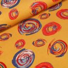 Tissu Jersey Coton Spirales colorées sur fond Jaune - Par 10 cm