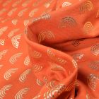 Tissu Jersey Coton Arc en ciel métallisé sur fond Orange