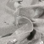 Tissu Jersey Coton Dino métalissé argenté sur fond Gris clair chiné