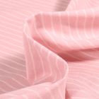 Tissu Coton lavé Rina sur fond Rose pâle