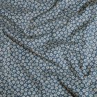 Tissu CotonEnduit Myosotis sur fond Bleu marine - Par 10 cm