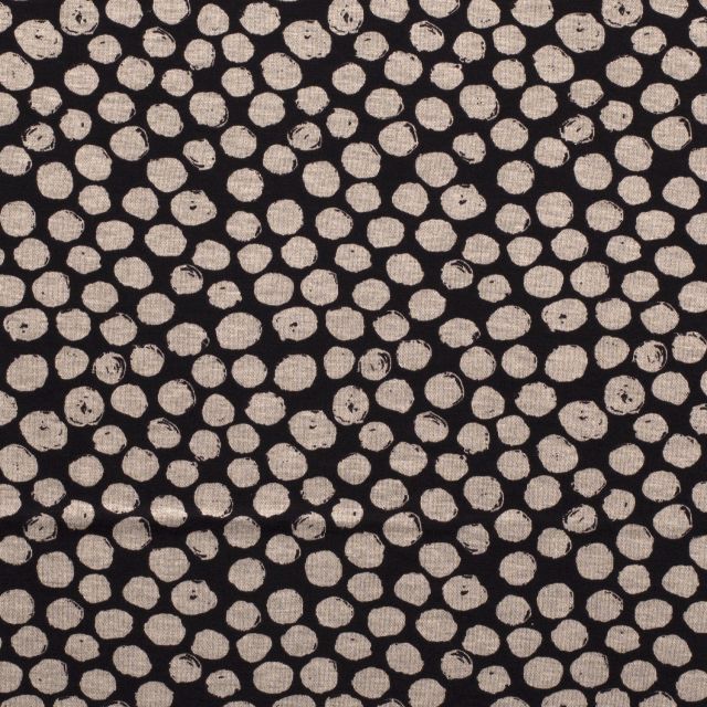 Tissu Maille Jersey Pois  sable sur fond Noir - Par 10 cm