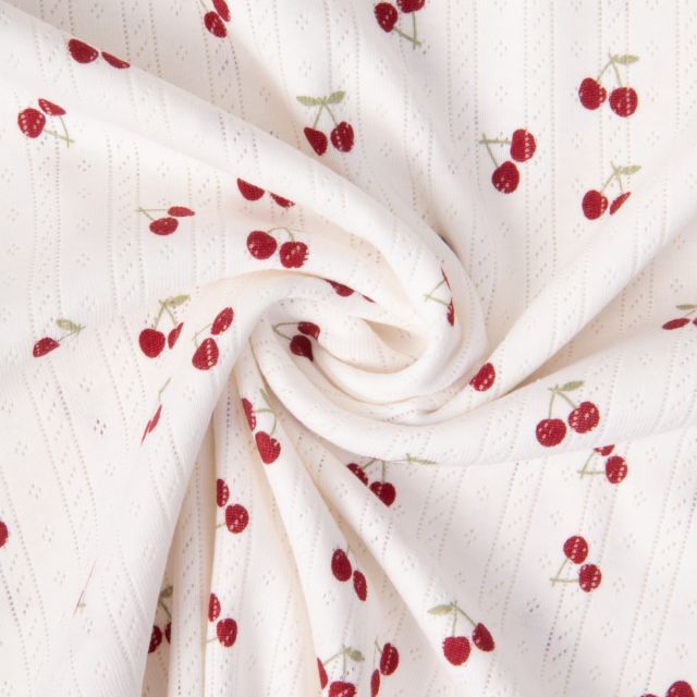 Tissu Jersey 100% Coton ajouré Baby petites cerises sur fond Ecru