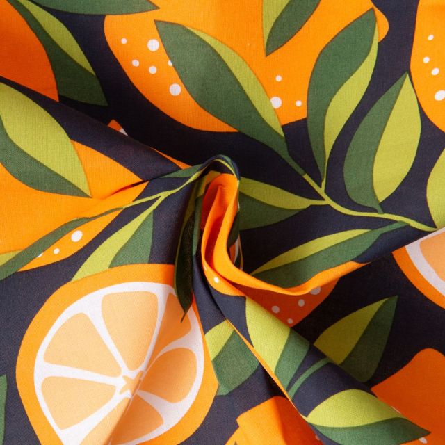 Tissu Coton enduit Fruité sur fond Bleu Marine - Par 10 cm