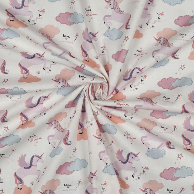Tissu Popeline de Coton Zelhia licornes magiques sur fond Blanc cassé