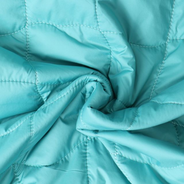 Tissu Doudoune Nilah matelassé réversible Bleu turquoise envers Mauve