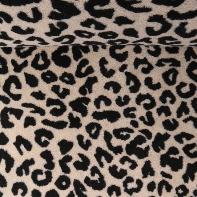 Tissu Fausse fourrure Mouton Kaïa imprimé léopard Noir sur fond Beige clair
