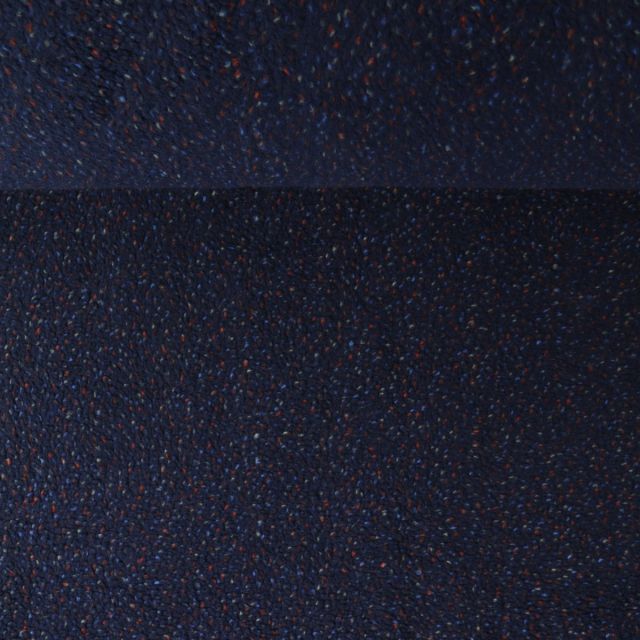 Tissu Fausse fourrure Mouton Toundra moucheté Rouge sur fond Bleu marine