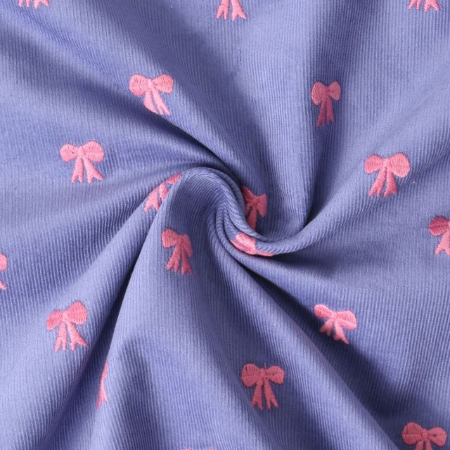Tissu Jersey Bord Côte Mimi noeuds Roses sur fond Violet