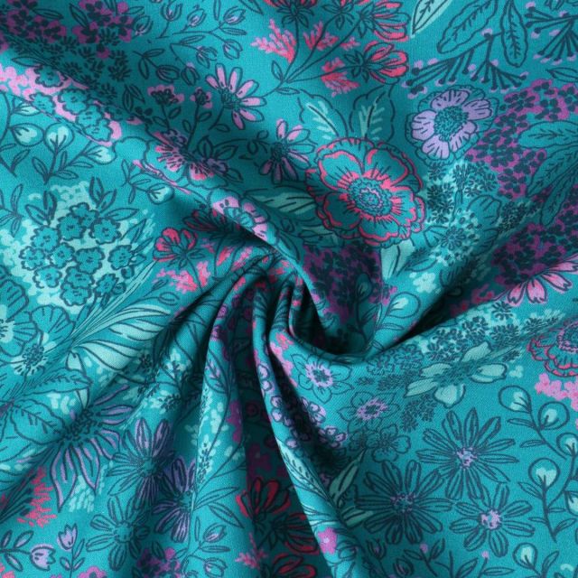 Tissu Popeline de Coton Amandine fleurs Roses sur fond Bleu turquoise