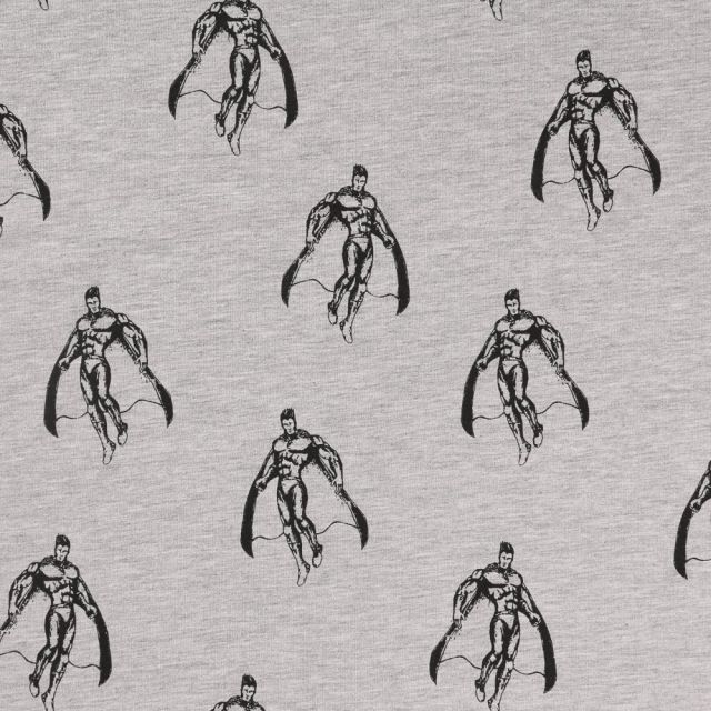 Tissu Jersey Super-héros noirs sur fond Gris - Par 10 cm