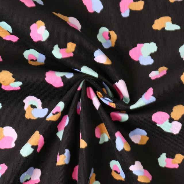 Tissu Jersey Bord Côte Mila motif léopard multicolore sur fond Noir profond