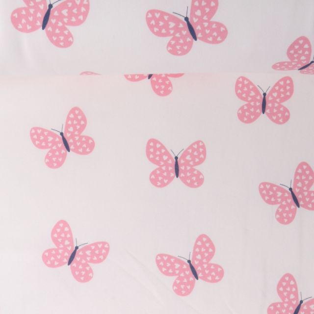 Tissu Sweat envers molletonné Lili papillons Roses sur fond Blanc cassé