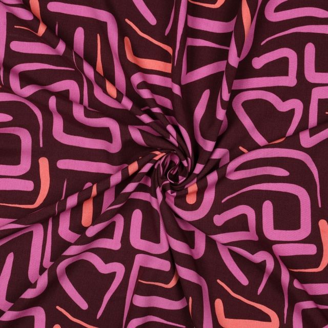 Tissu Viscose imprimé motifs abstraits Rose et Corail sur fond Bordeaux foncé