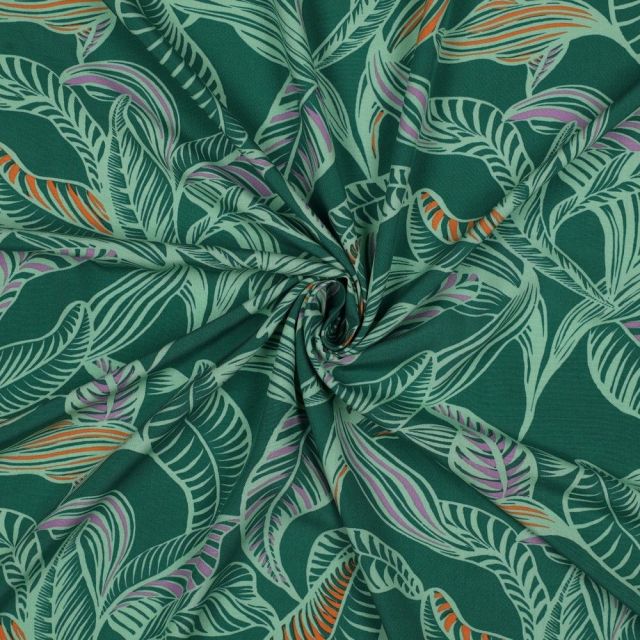 Tissu Viscose EcoVero feuilles Tropicales sur fond Vert sapin