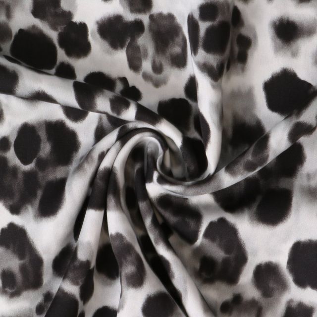Tissu Viscose Inès motif façon léopard Noir sur fond Blanc cassé