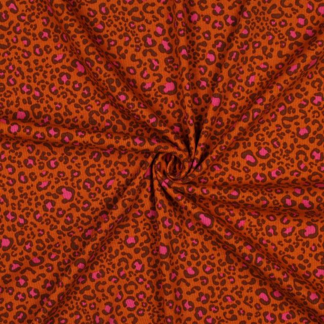 Tissu Jersey Coton côtelé Léopard Chocolat & Rose pop sur fond Rouille