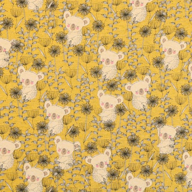 Tissu Jersey Coton Koalas et fleurs noirs et jaune clair sur fond Jaune moutarde - Par 10 cm