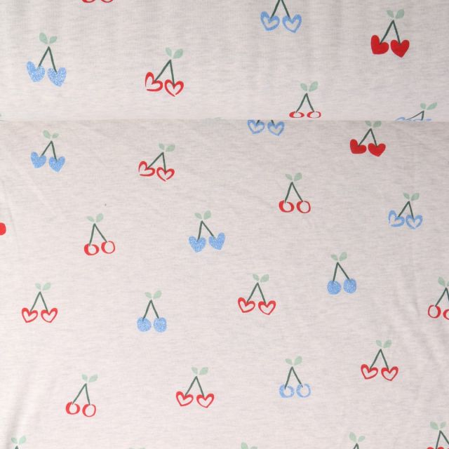 Tissu Sweat  léger envers molletonné Margot cerises Bleues pailletées sur fond Blanc chiné