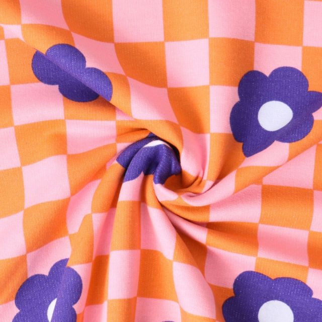 Tissu Sweat léger envers molletonné Jade fleurs Violettes sur fond Rose