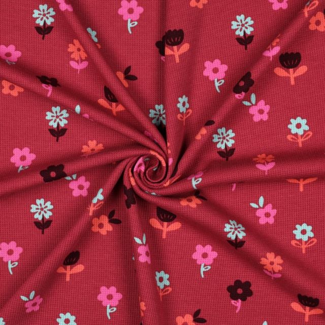 Tissu Jersey Nid d'abeille imprimé Fleurs sur fond Framboise