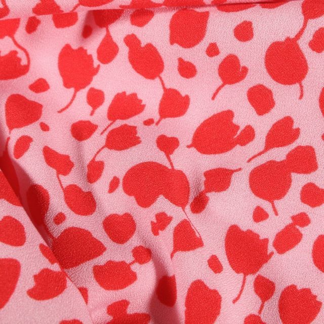 Tissu Crêpe stretch Tulipes rouges sur fond Rose - Par 10 cm
