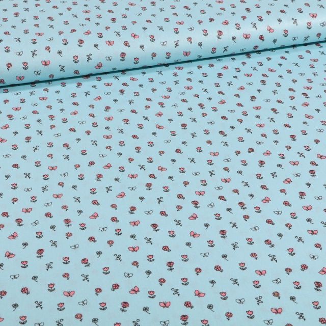 Tissu Coton imprimé Petits bouquets de fleurs et papillons sur fond Bleu - Par 10 cm