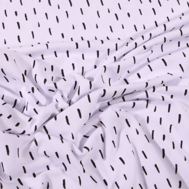 Tissu Jersey Coton Bio Pointillés noirs sur fond Blanc - Par 10 cm