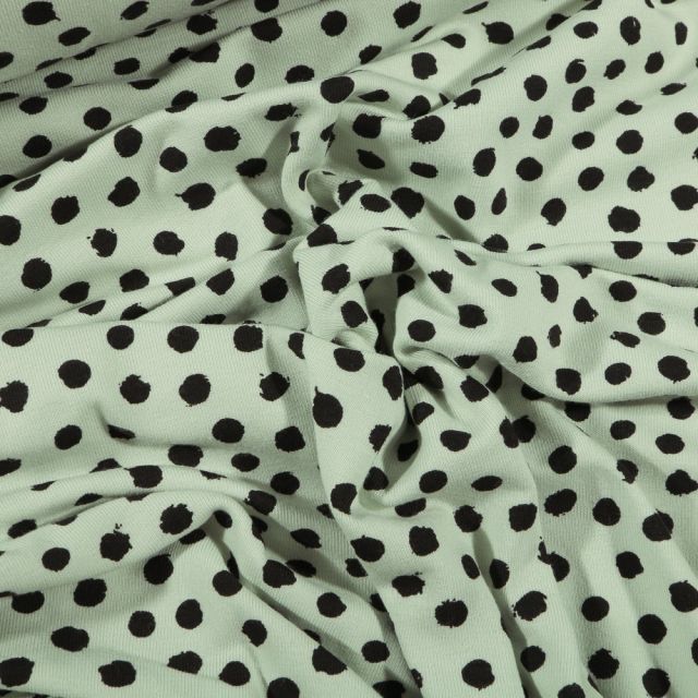 Tissu Jersey Coton Bio Pois déstructurés noirs sur fond Vert menthe - Par 10 cm