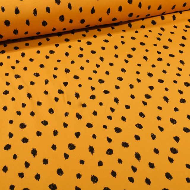 Tissu Sweat léger envers molletonné Bio Pois noirs sur fond Jaune curcuma - Par 10 cm