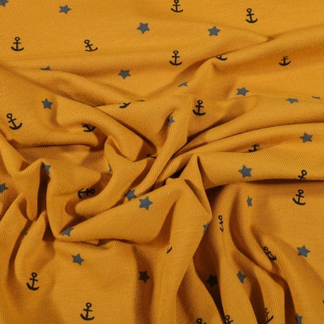Tissu Jersey Coton Etoiles et ancres bleues et vertes sur fond Jaune - Par 10 cm