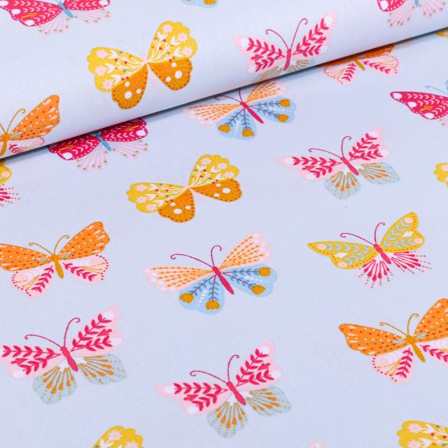 Tissu Coton imprimé LittleBird Papillons multicolores sur fond Bleu