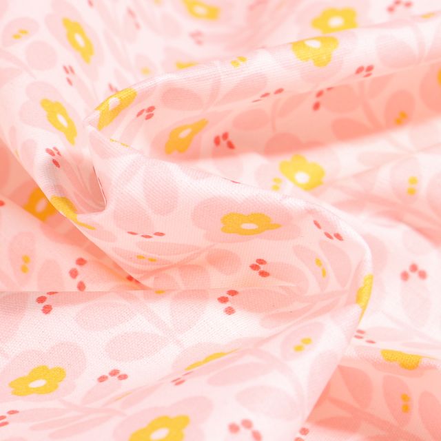 Tissu Coton enduit Fleurs seventies rose et jaune sur fond Blanc