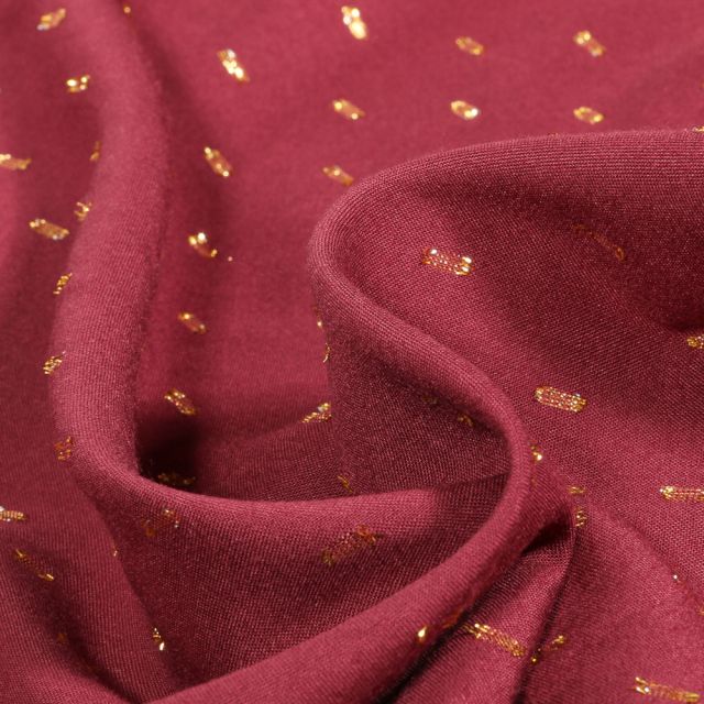 Tissu Viscose Pointilurex sur fond Bordeaux
