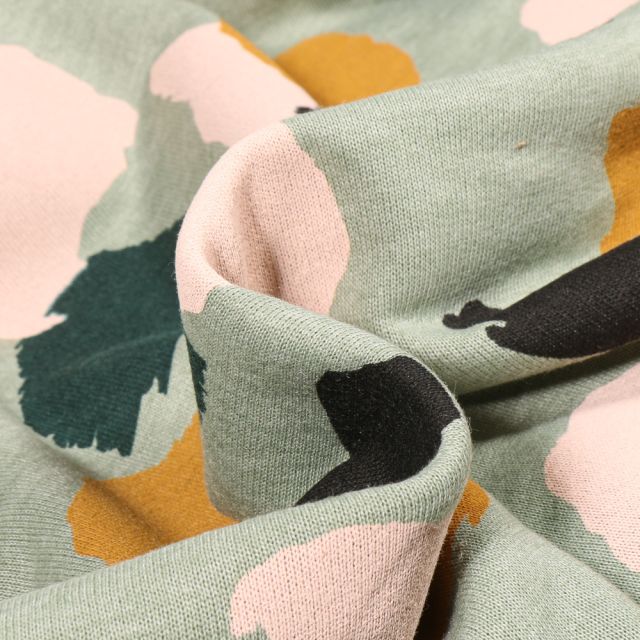 Tissu Sweat Denia sur fond Vert amande