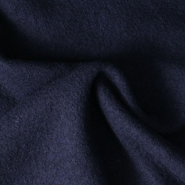Tissu Laine Bouillie  uni Hanna sur fond Bleu marine