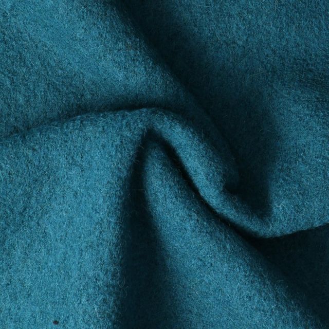 Tissu Laine Bouillie  uni Hanna sur fond Bleu pétrole