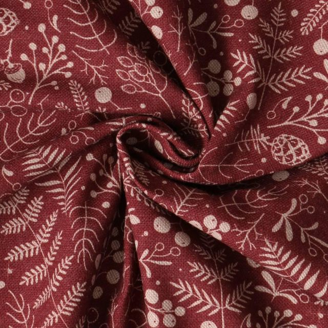 Tissu Toile de Coton Céleste végétaux d'hiver sur fond Bordeaux