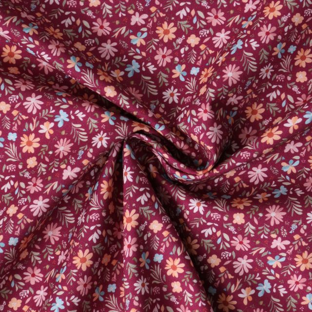 Tissu Popeline de Coton  Mélusine motif floral multicolore sur fond Prune