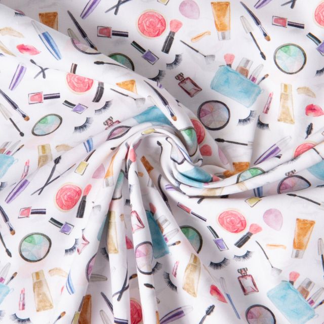Tissu Coton imprimé Make-up Moments sur fond Blanc