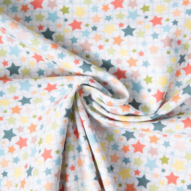 Tissu Coton imprimé Multi stars sur fond Blanc