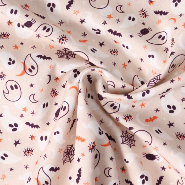 Tissu Popeline de Coton  Petits Fantômes sur fond Rose nude