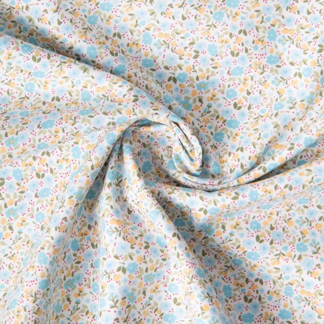 Tissu Coton imprimé Liberté floral jaune bleu sur fond Blanc