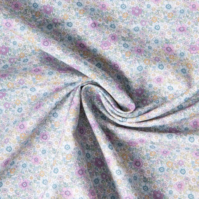 Tissu Coton imprimé Liberté floral  bleu violet sur fond Blanc