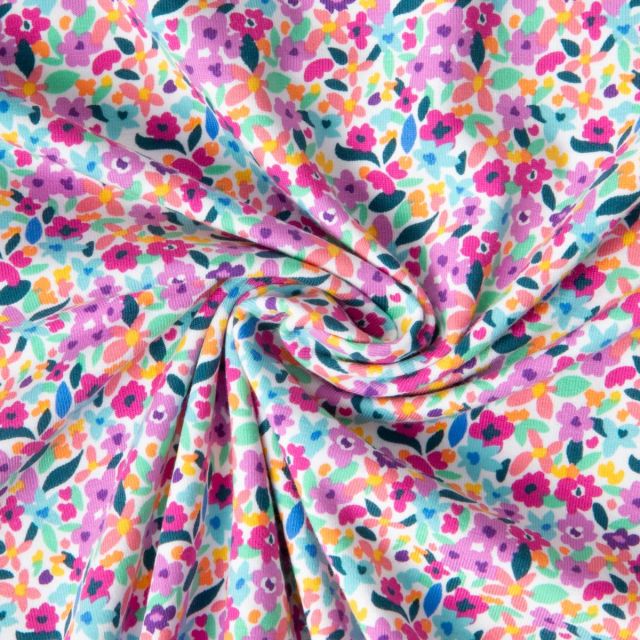 Tissu Jersey de Coton Nina pop sur fond Blanc