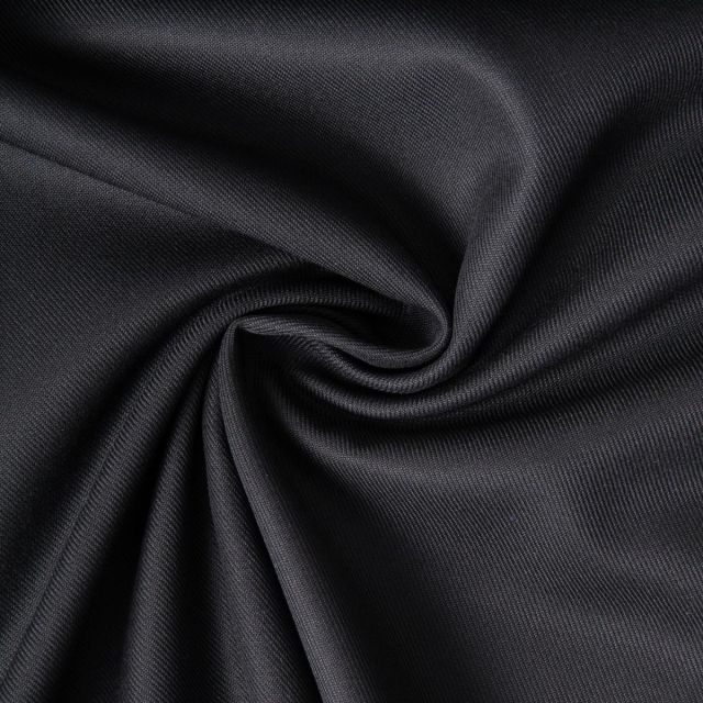 Tissu Sergé Polyviscose  Hispania sur fond Noir