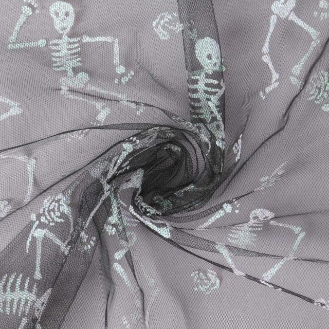 Tissu Tulle souple  Morgana squelettes paillettes argentés et irisés sur fond Noir